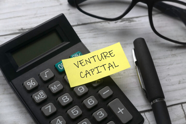 Calculadora com a palavra Venture Capital escrita